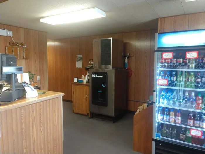 Kwik-Fill Plaza Motel 4